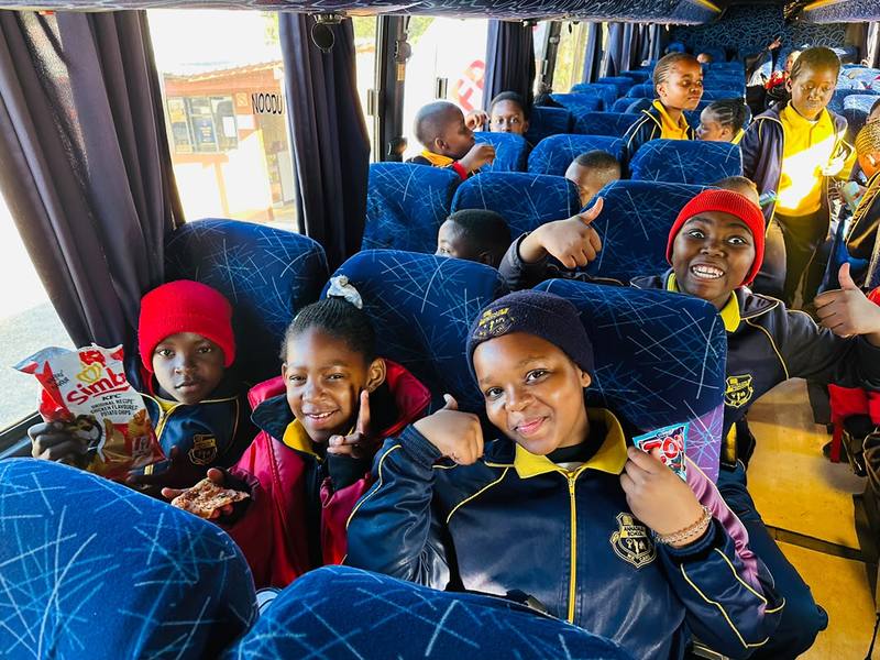 Pupils on the bus during a school trip