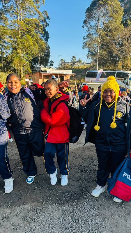 Pupils with medals and prize bags